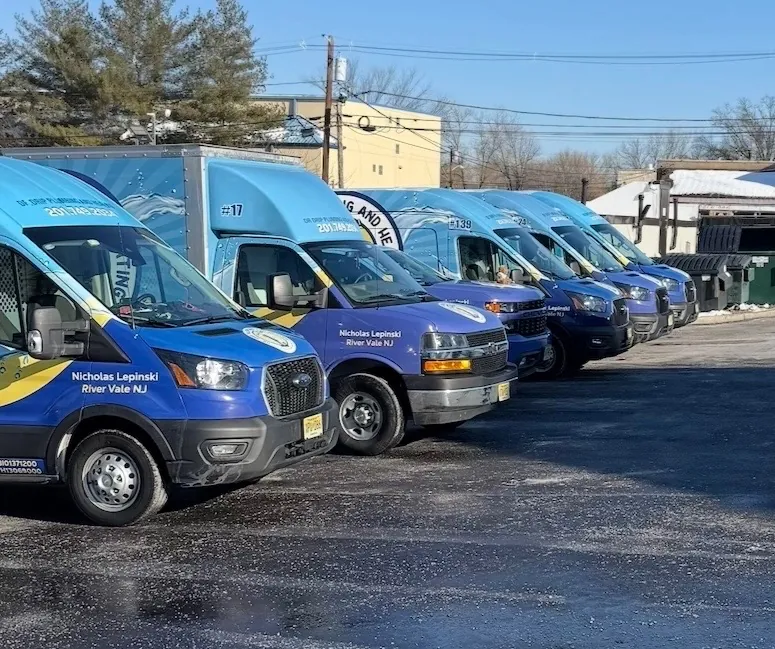 Fleet of Dr. Drip Plumbing and Heating service vans driven by Nicholas Lepinski in River Vale, NJ